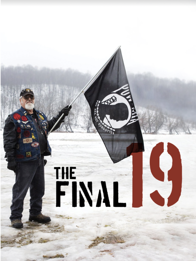 Man holding a flag for Prisoner of War and Missing in Action, on a snowy background with the film title "The Final 19"